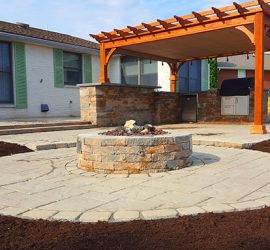 Outdoor kitchen, firepit and pergola