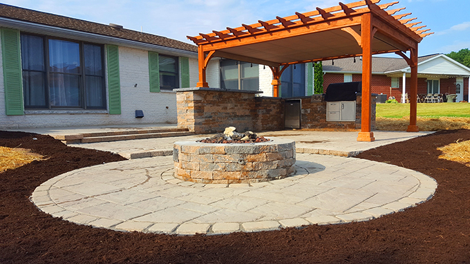 Outdoor kitchen, firepit and pergola