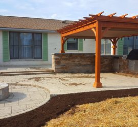 Outdoor kitchen, firepit and pergola