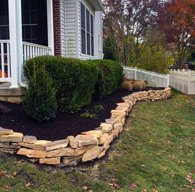 Natural Stacked Stone Garden Wall