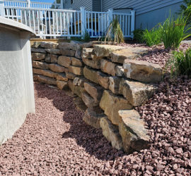 Natural Boulder Retaining Wall and landscaping